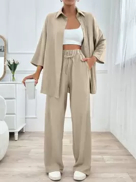 Oferta de Cottnline Conjunto casual de 2 piezas holgado de blusa de manga larga con hombros caídos y pantalones con cintura ajustable en unicolor, para primavera y verano por 19,99€ en SheIn