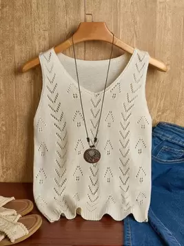 Oferta de SHEIN LUNE Blusa de punto de unicolor con diseño calado para mujer, ideal para vacaciones por 5,59€ en SheIn