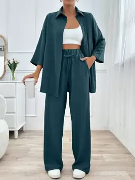 Oferta de SHEIN Set informal de 2 piezas de camisa y pantalones sueltos con botones delanteros de unicolor para mujer, otoño por 18,99€ en SheIn