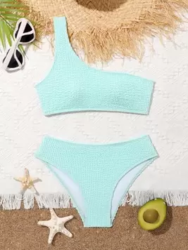 Oferta de SHEIN Conjunto de bikini de un hombro liso para niña preadolescente, playa de verano por 8,49€ en SheIn