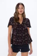 Oferta de Blusa fluida escote lace por 9,99€ en Springfield