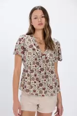 Oferta de Blusa fluida escote lace por 9,99€ en Springfield