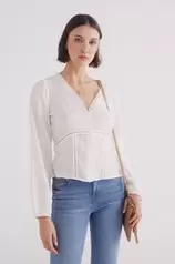 Oferta de Blusa escote pico lace por 35,99€ en Springfield