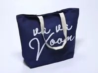 Oferta de BOLSO PLAYA 50X38CM AZUL LISO por 14,99€ en Tiendas Mi Casa