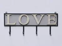 Oferta de PERCHERO METAL NEGRO LETRAS LOVE 48CM por 18,99€ en Tiendas Mi Casa