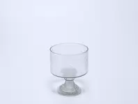 Oferta de PORTAVELAS DE CRISTAL 18X18XH.22CM por 18,99€ en Tiendas Mi Casa