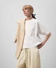 Oferta de Jersey punto jacquard logotipado mujer por 99€ en U Adolfo Domínguez