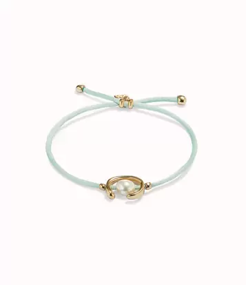 Oferta de 18K gold-plated blue green thread bracelet with shell pearl accessory. por 70€ en Uno de 50