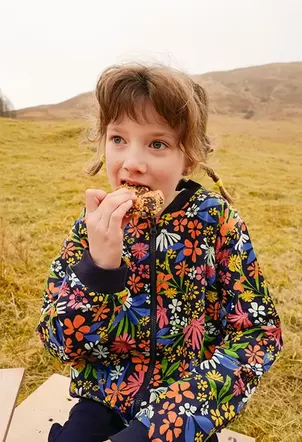 Oferta de Bomber de punto para niña con estampado de flores por 35,95€ en Boboli