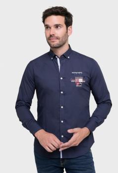 Oferta de Camisa Polo Team bordada color azul marino por 55,93€ en Valecuatro