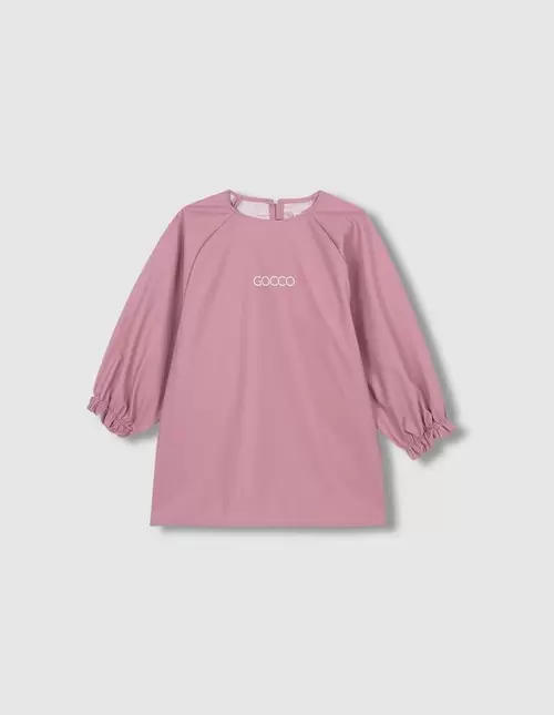 Oferta de Babero con mangas rosa suave por 19,99€ en Gocco