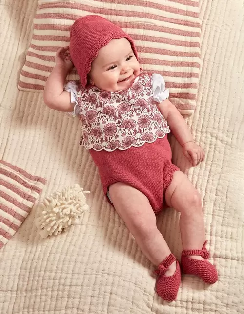 Oferta de Babero con bordados rosa por 12,99€ en Gocco