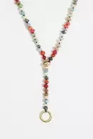 Oferta de Collar largo piedras multicolores dorado por 45,5€ en Bimba & Lola