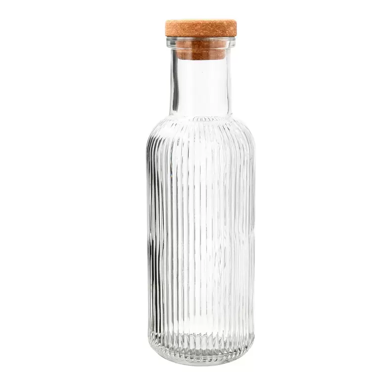 Oferta de Botella mesa tapón corcho 1L vidrio acanalado Maison Quid por 3,2€ en Ohgar