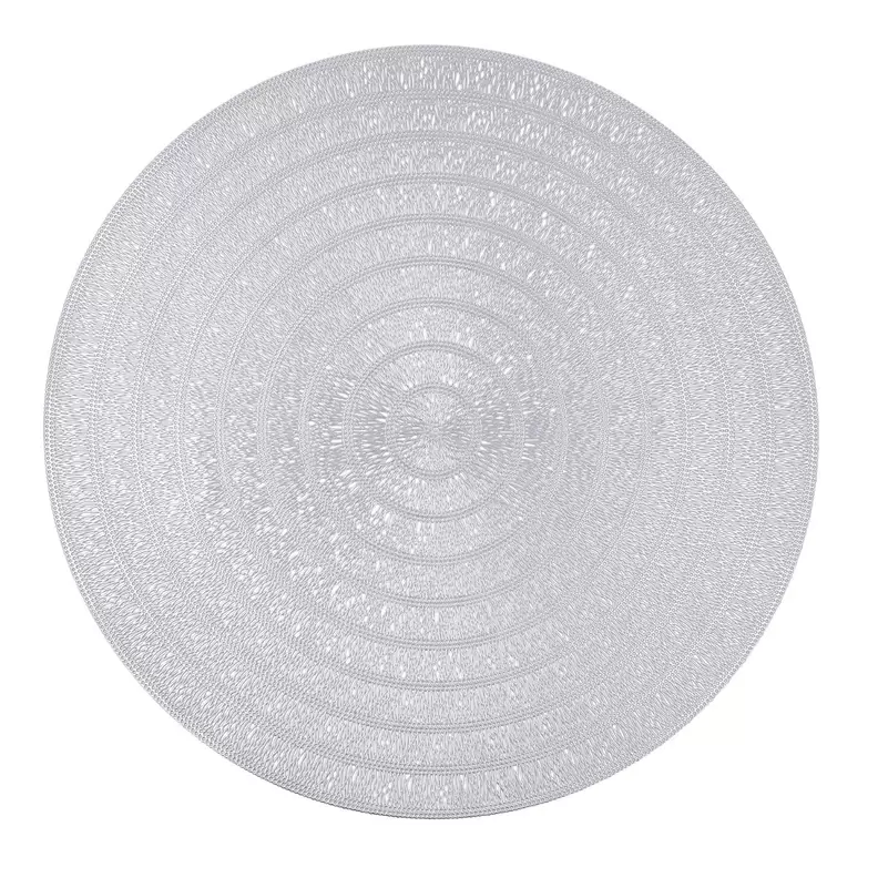 Oferta de Mantel individual redondo 38cm polipropileno plata bucle Habitat Quid por 1,75€ en Ohgar