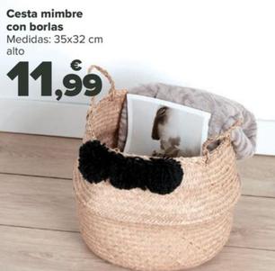 Oferta de Cesta mimbre con borlas por 11,99€ en Carrefour