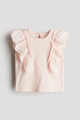 Oferta de Blusa de algodón con volantes por 5,99€ en H&M