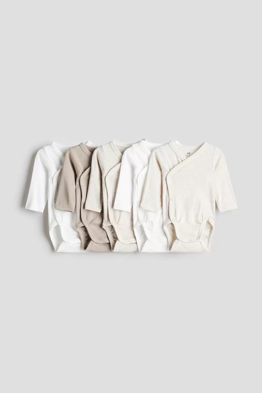 Oferta de Pack de 5 bodies cruzados por 19,99€ en H&M