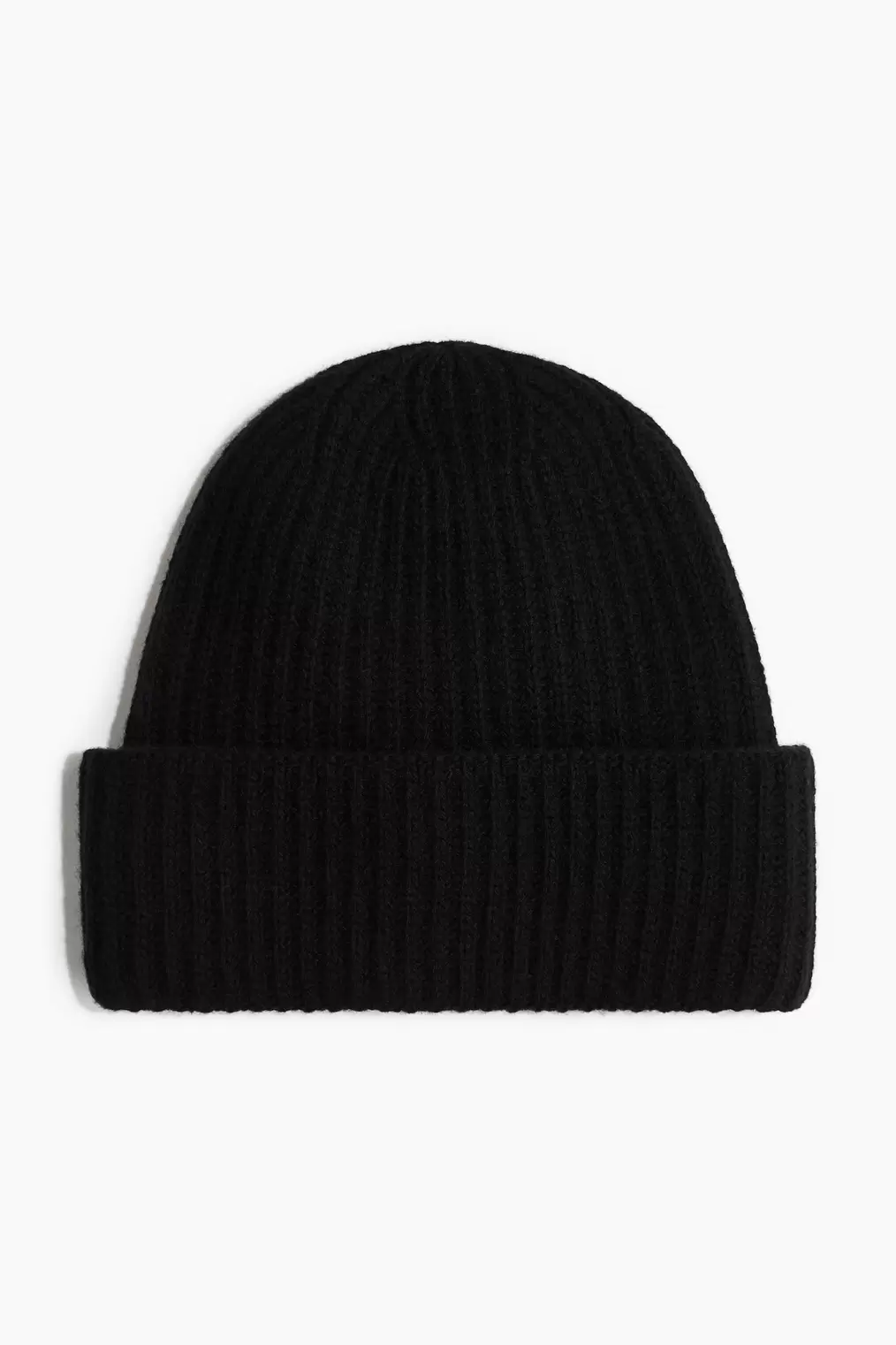 Oferta de Gorro en mezcla de lana acanalada por 308,99€ en H&M