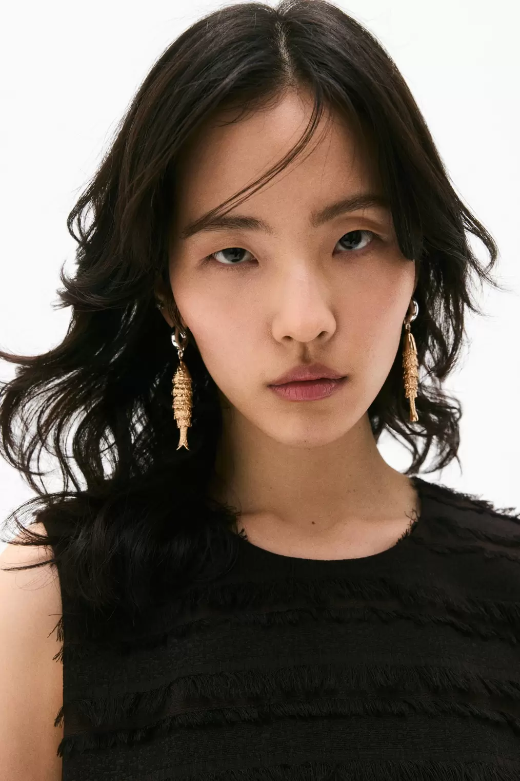 Oferta de Pendientes con colgante de pez por 19,99€ en H&M