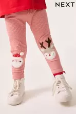 Oferta de Diseño navideño a rayas de Papá Noel en rojo - Leggings con adornos (3 meses a 7 años) por 10,12€ en Next