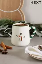 Oferta de Taza de muñeco de nieve por 9€ en Next